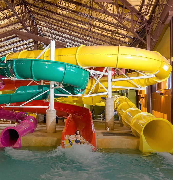 a woman on a water slide