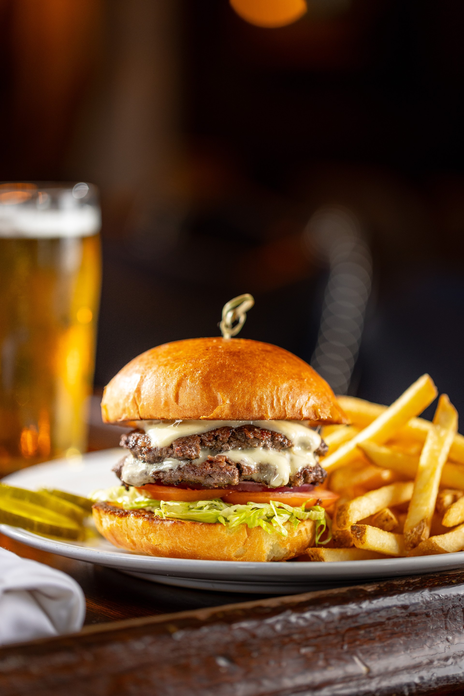 a burger and fries on a plate