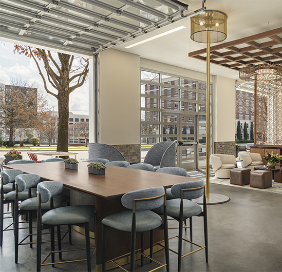 a room with a table and chairs