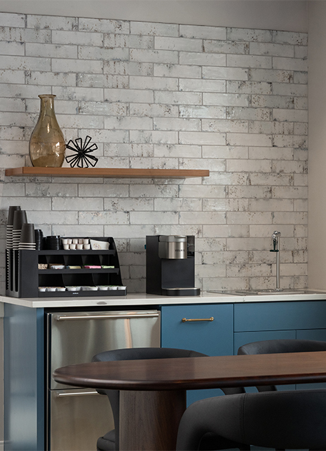 a kitchen with a counter top and a shelf