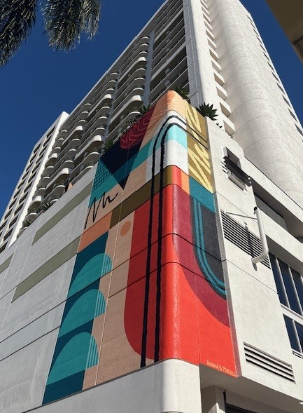 a building with a colorful mural on the side