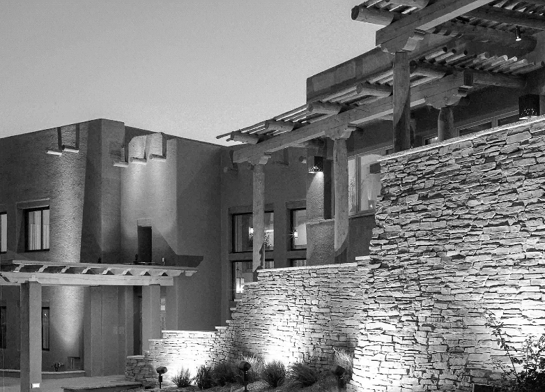 a stone wall with a stone structure