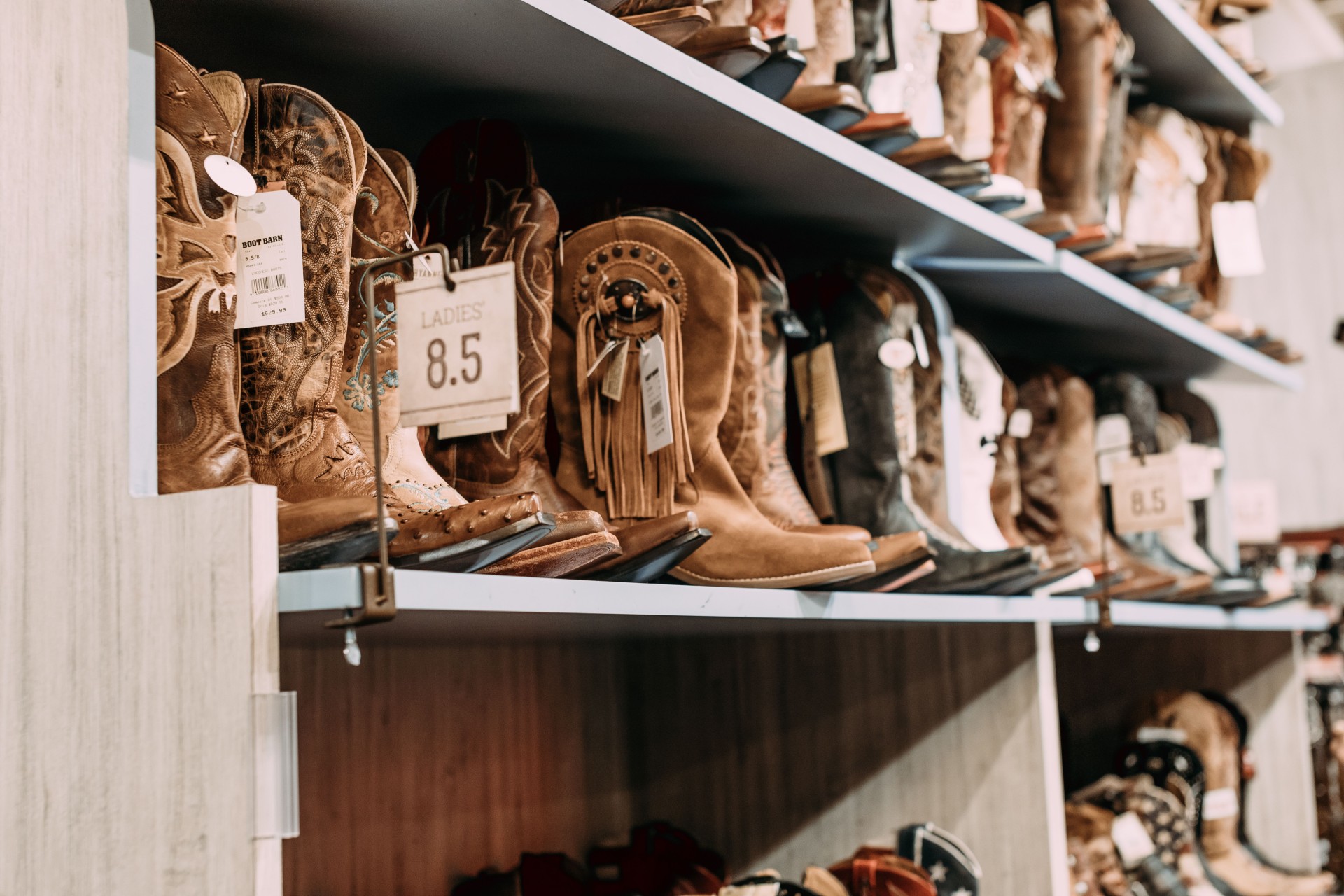 a shelf with boots on it