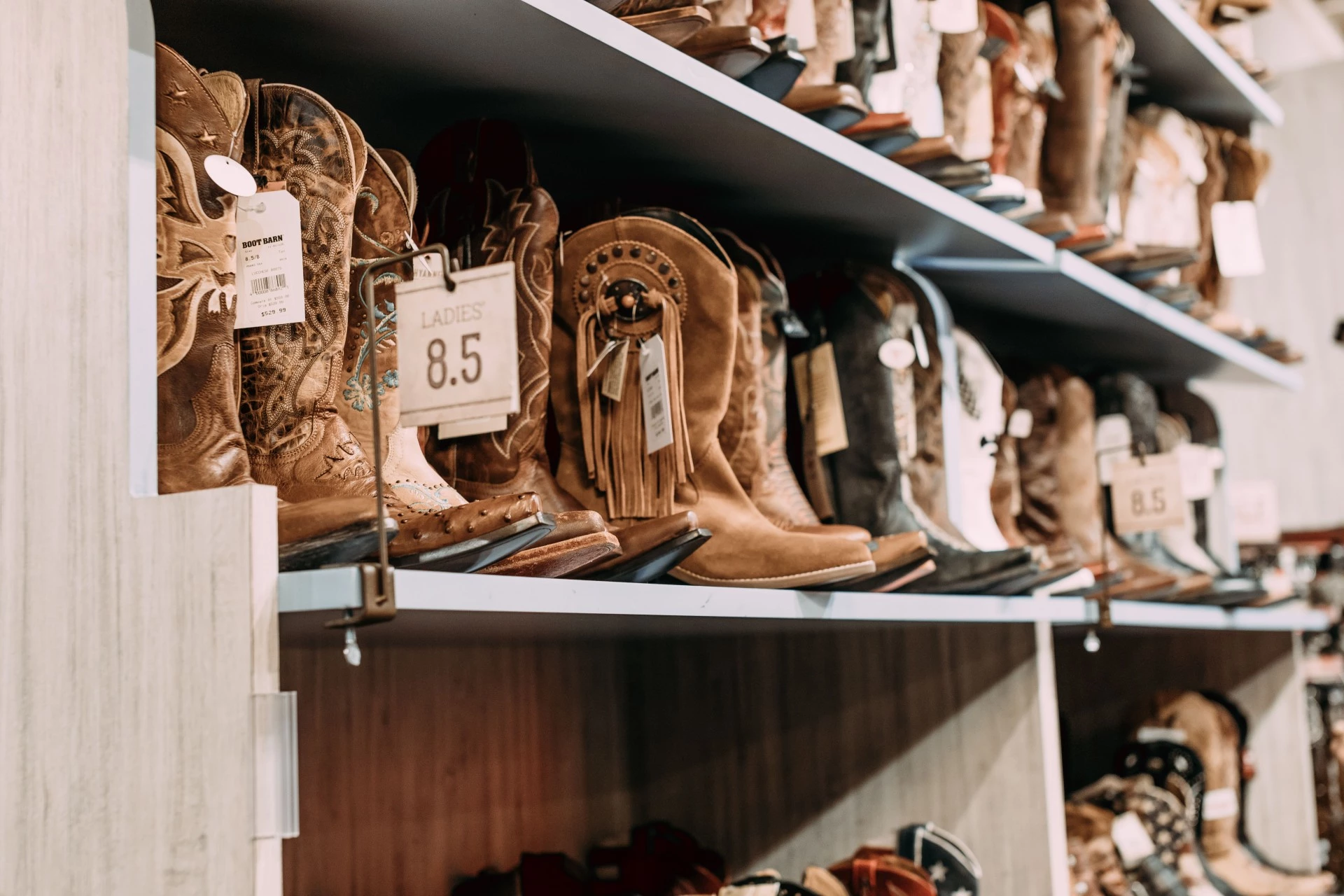 a shelf with boots on it