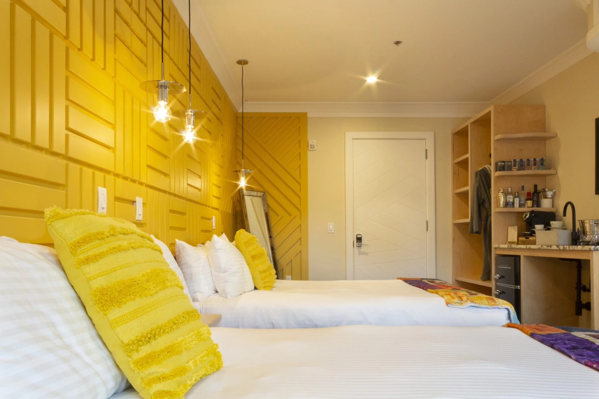a room with two beds and a closet