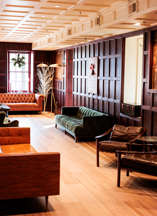 a room with couches and chairs