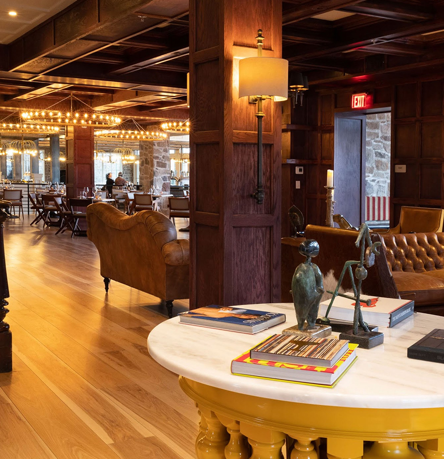 a room with a table and chairs