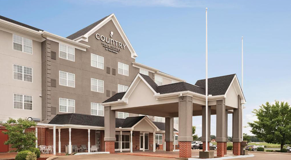 a building with a flag pole