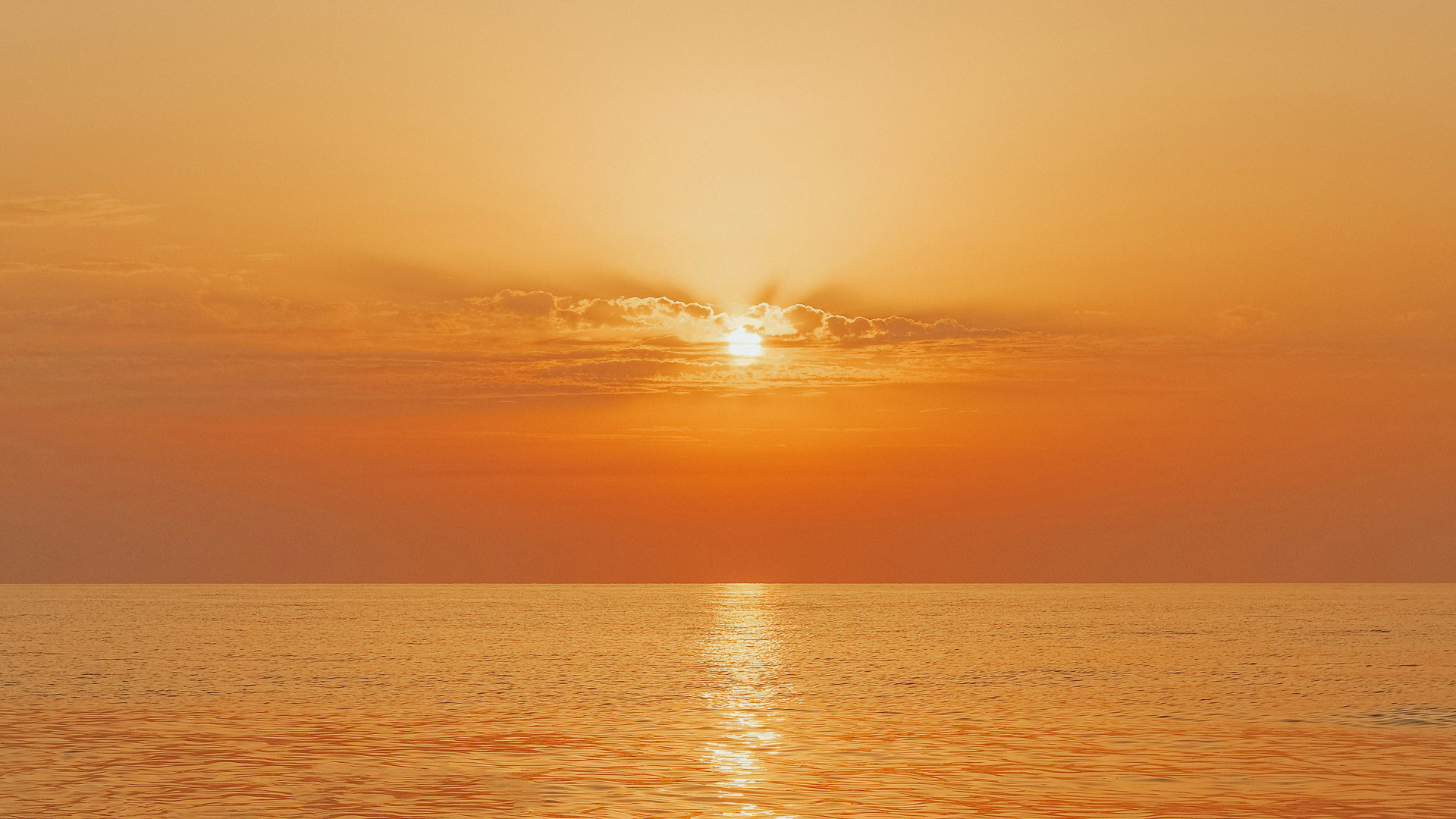 a sunset over the ocean