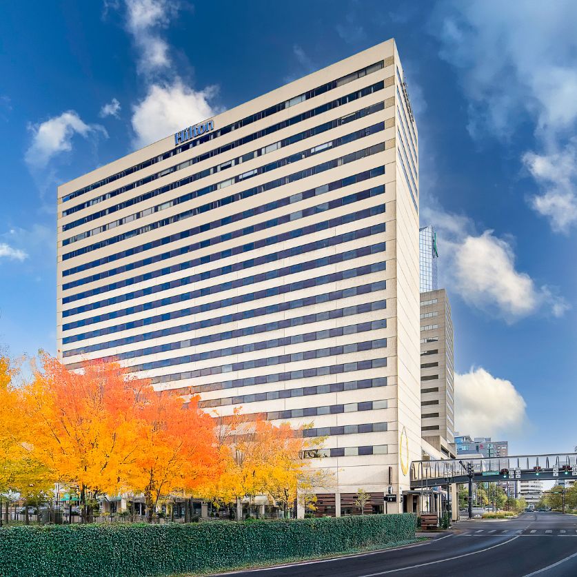 a building with trees in front of it