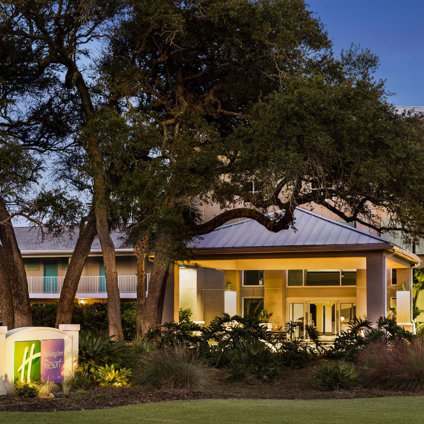 a building with trees around it