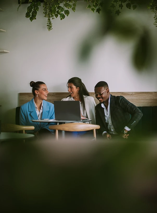 a group of people sitting at a table