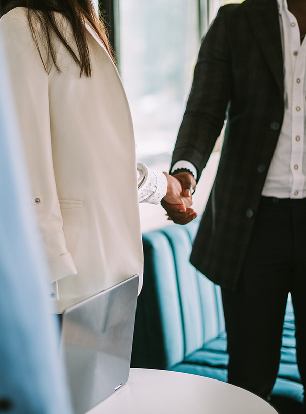 a man and woman shaking hands