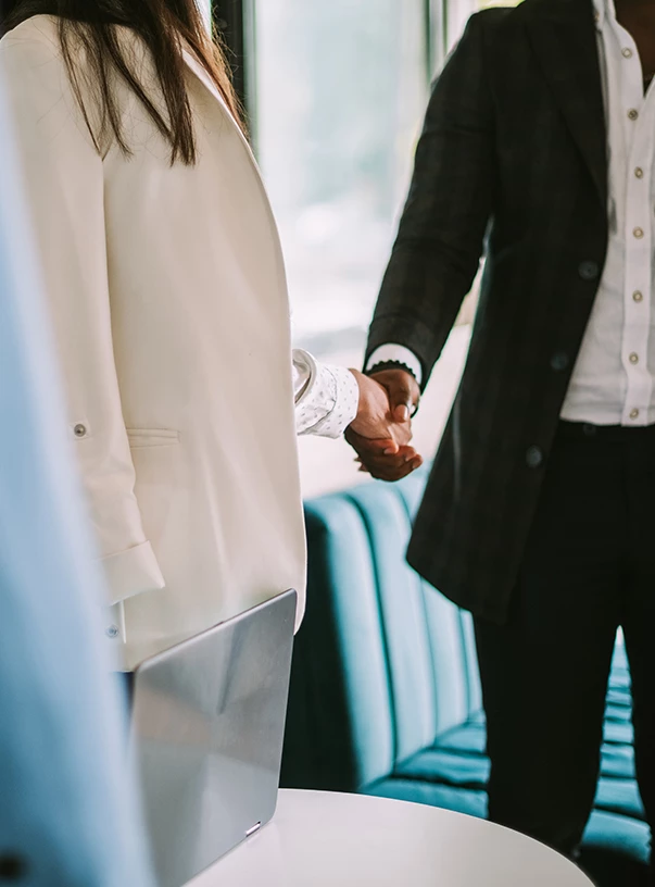 a man and woman shaking hands