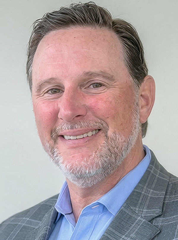 a man smiling for a picture