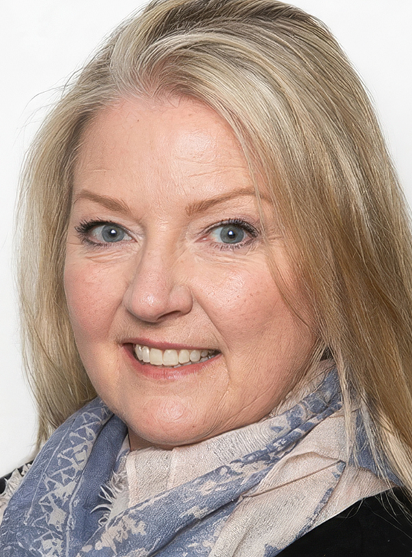 a woman with blonde hair and blue eyes