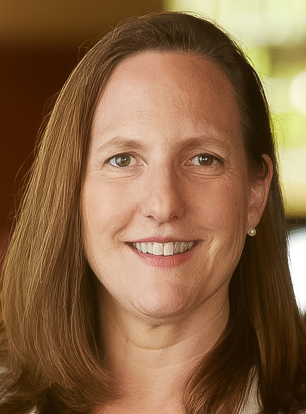 a woman smiling for a picture