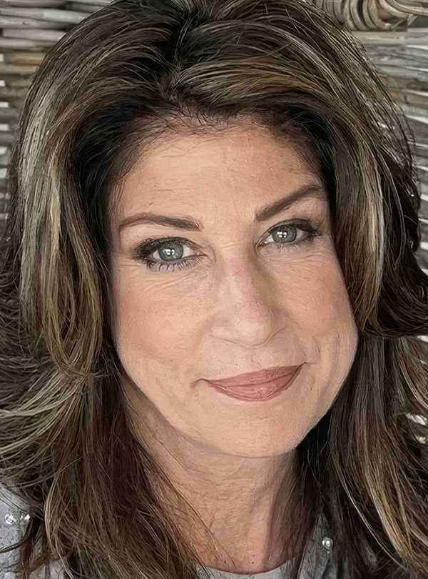 a woman smiling for the camera
