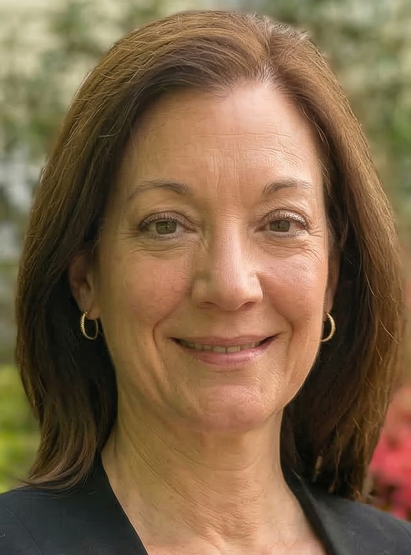 a woman smiling for a picture