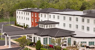 a building with trees in the background