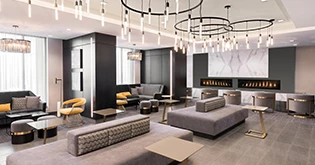 a room with couches and a fireplace