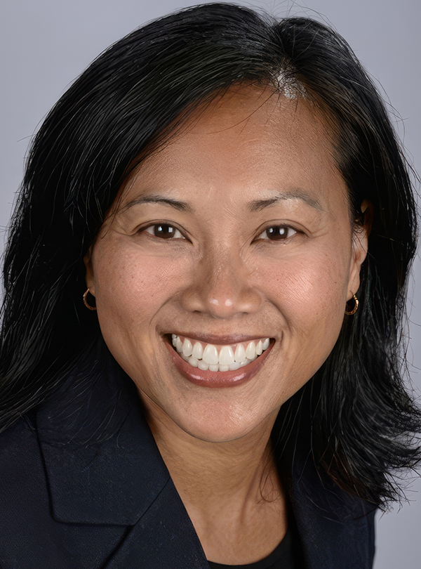 a close-up of a woman smiling