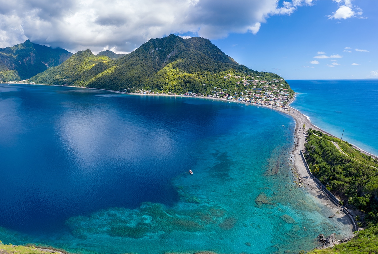 a body of water with a town on the side