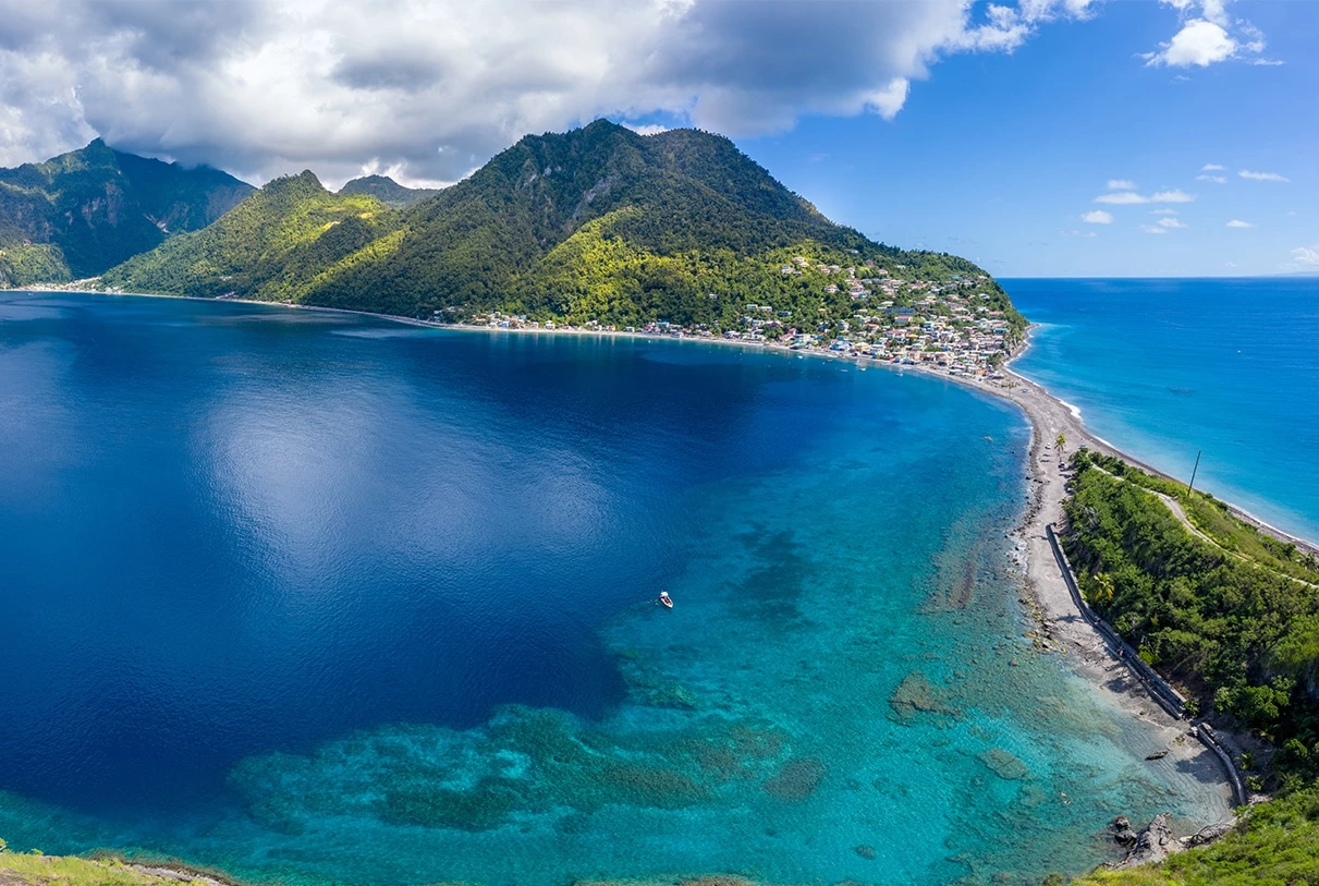 a body of water with a town on the side