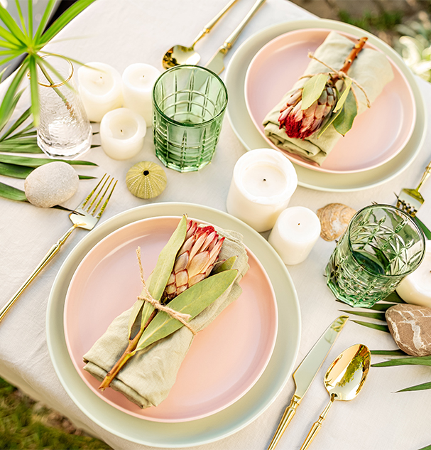 a table with plates and cutlery