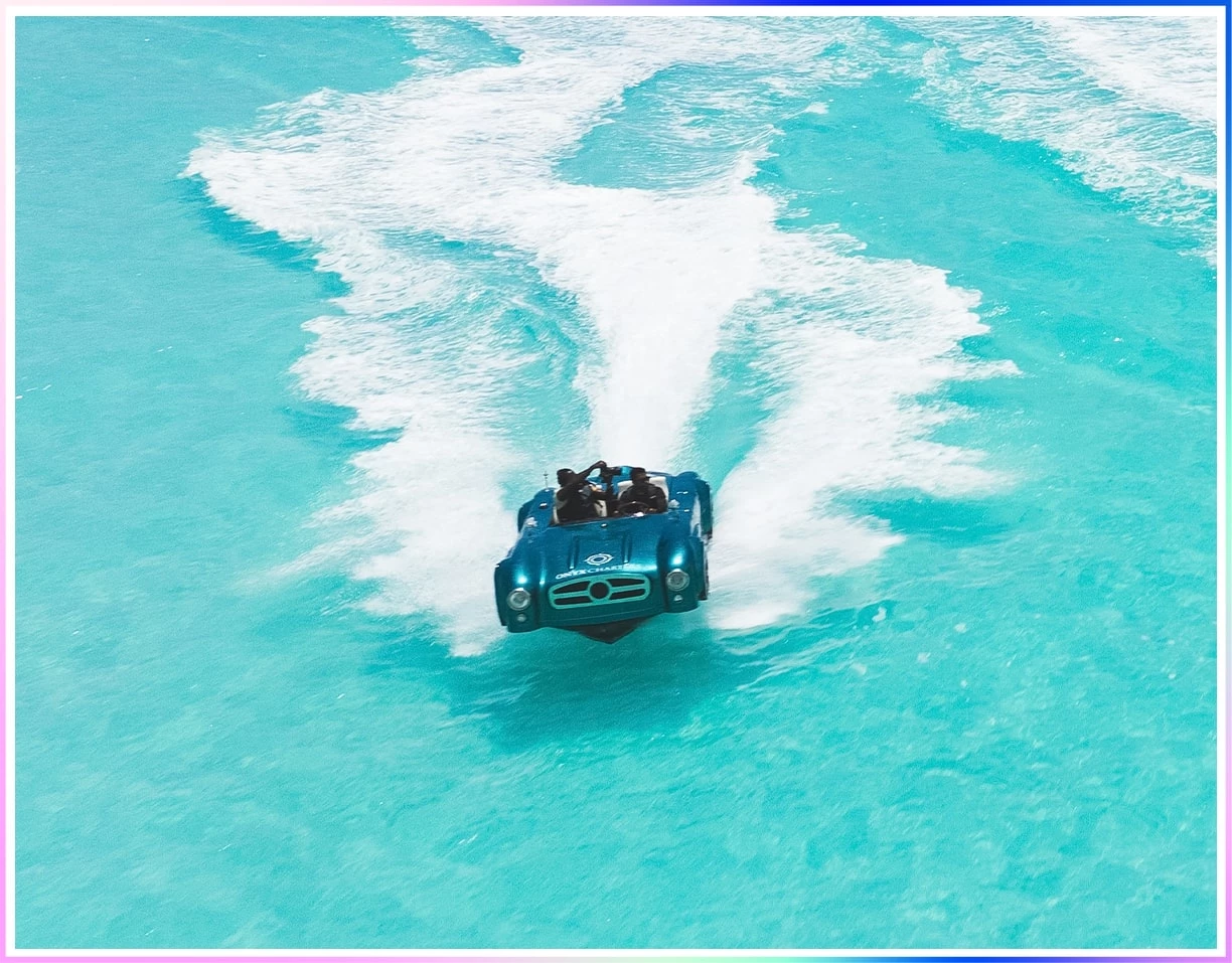 a blue car on water
