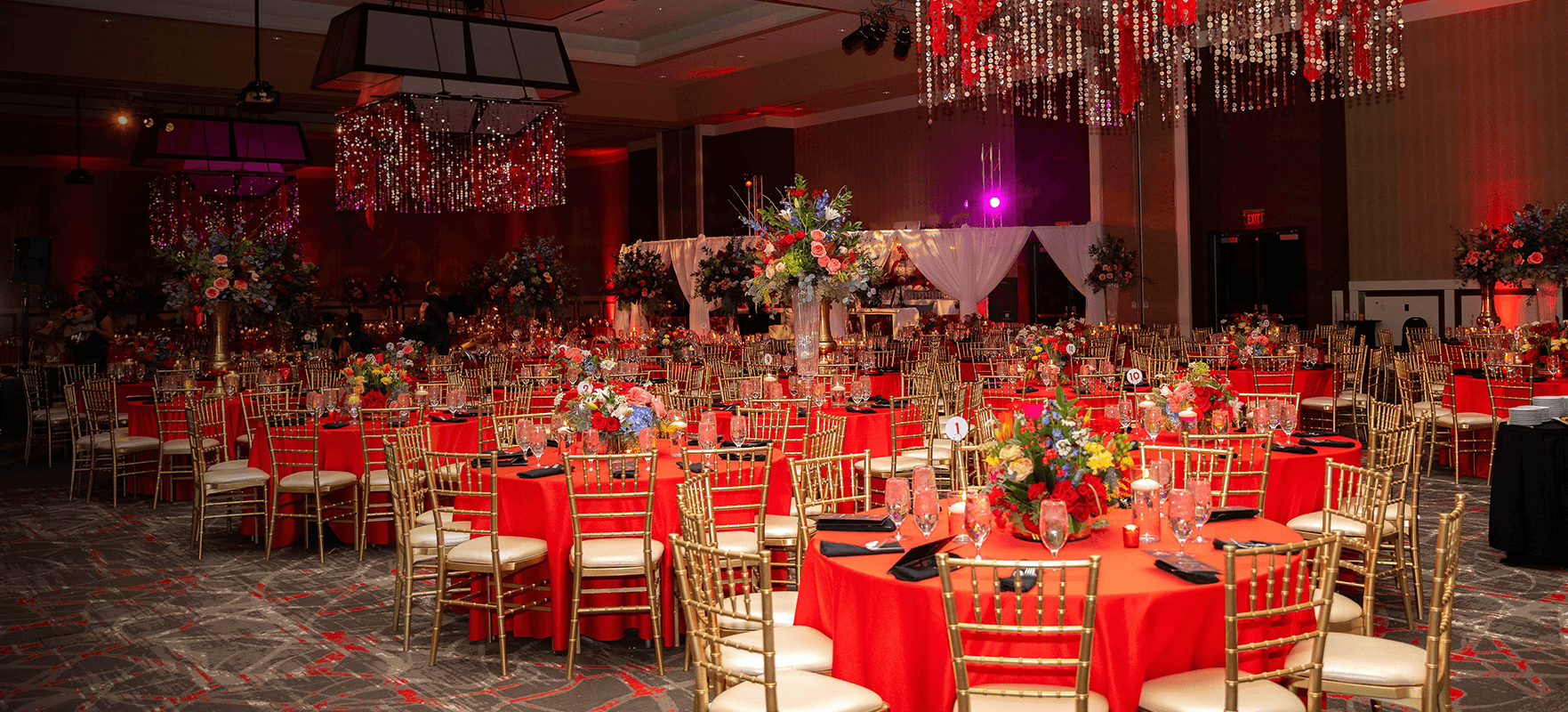 a large room with tables and chairs