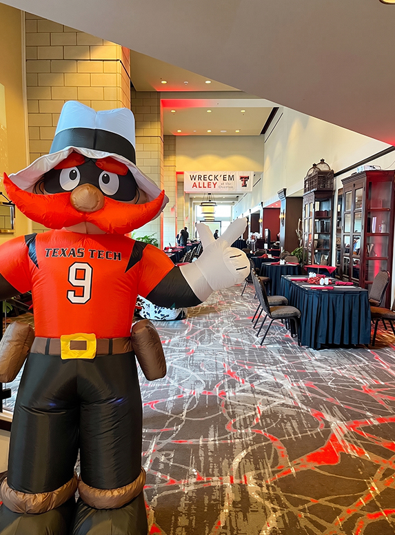a inflatable mascot in a room