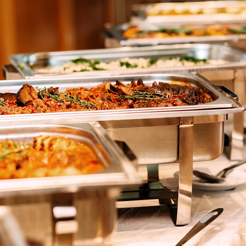 a buffet line of food