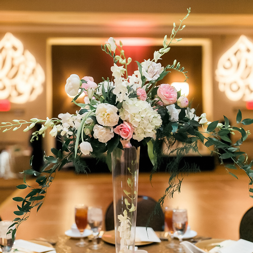 a vase of flowers on a table