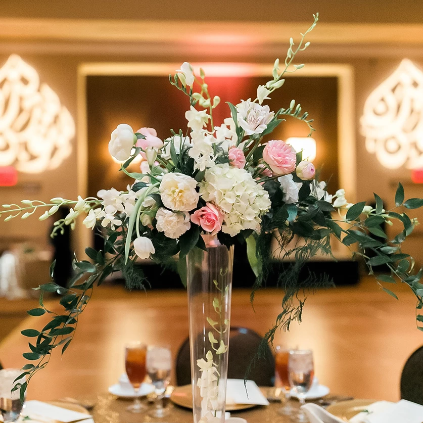 a vase of flowers on a table