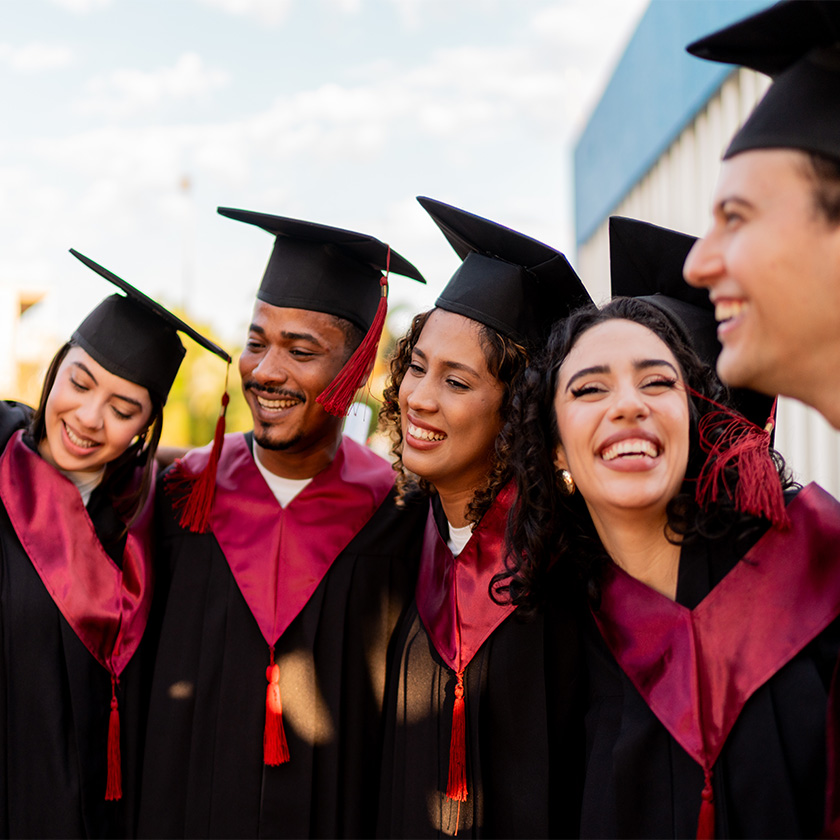 a group of people in graduation gowns