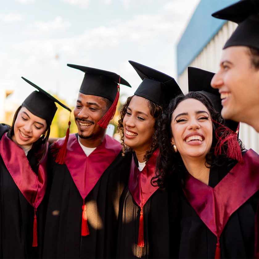 a group of people in graduation gowns