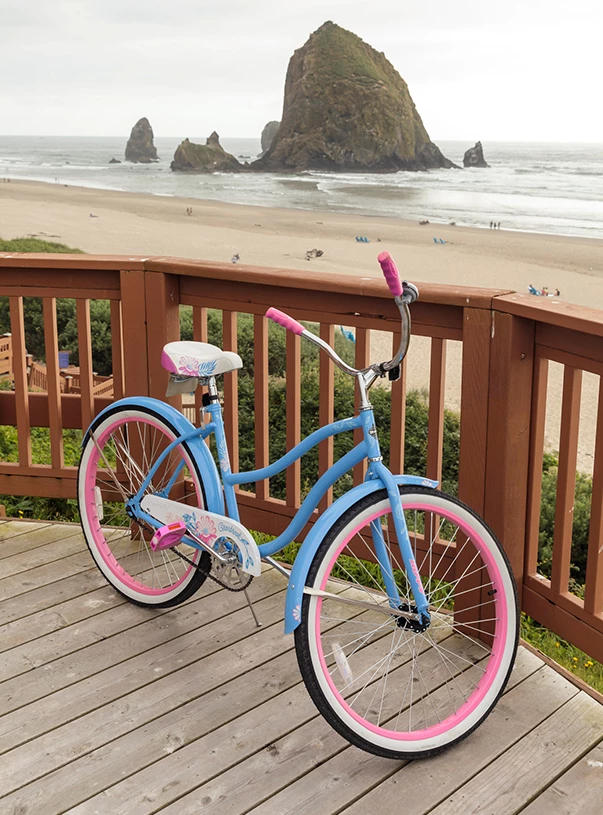 a bicycle parked on a wooden deck