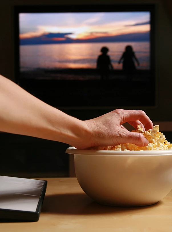 a hand holding a bowl of food