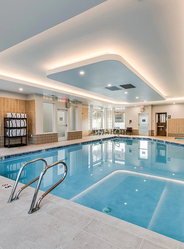 a swimming pool in a large room