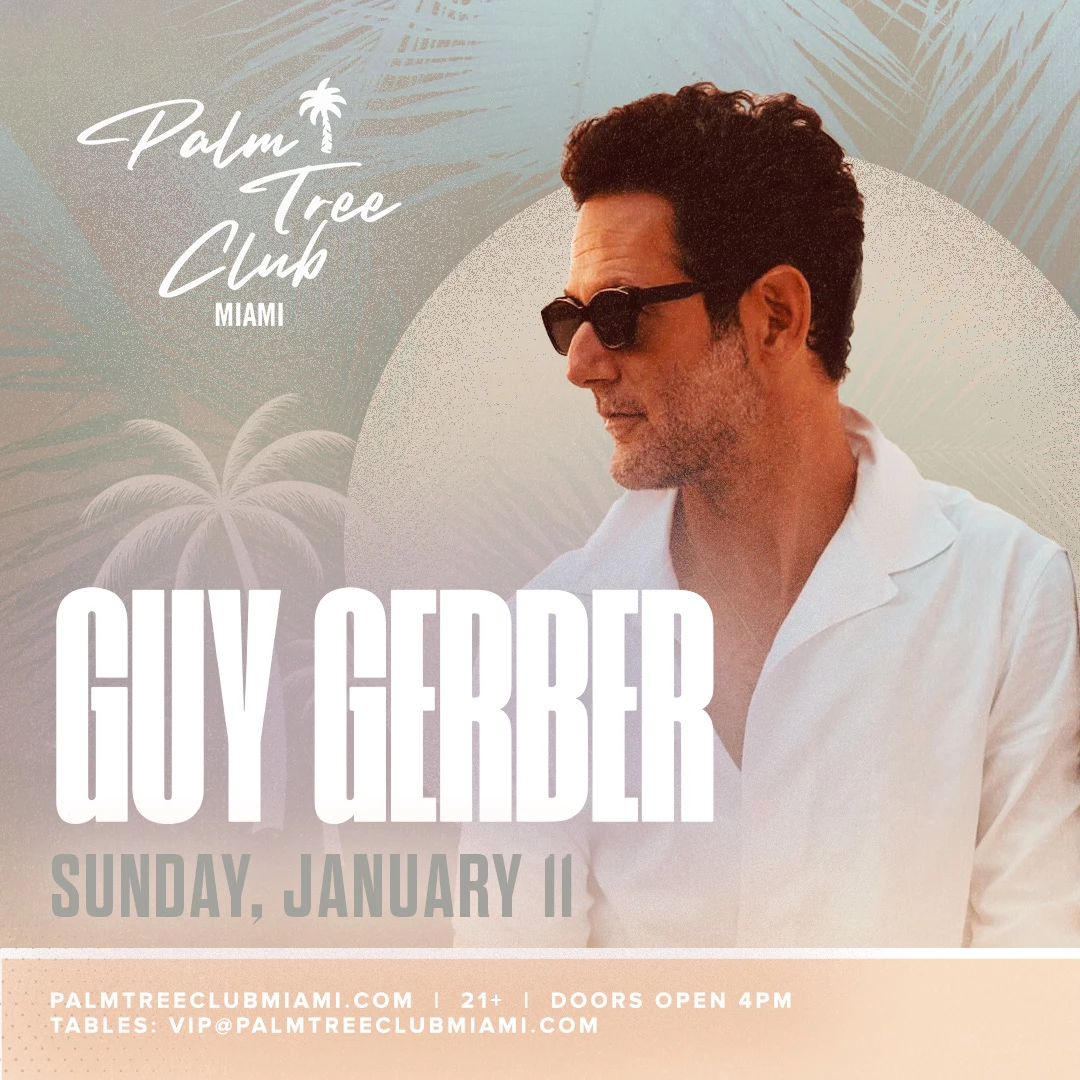 a man wearing sunglasses and a white shirt