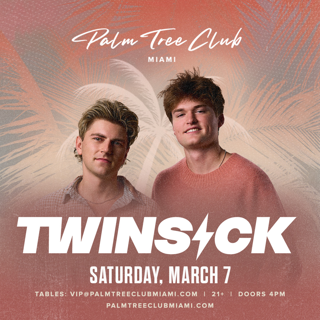 a couple of men posing for a photo