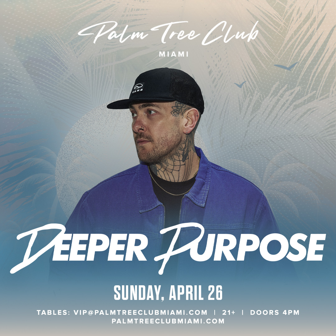 a man wearing a hat and blue jacket