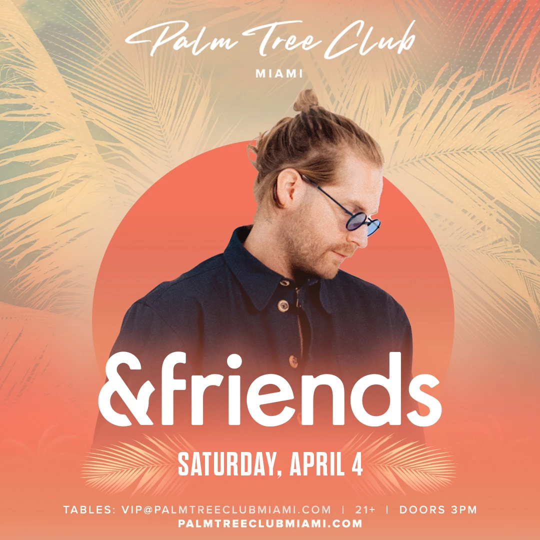 a man wearing glasses and a blue shirt