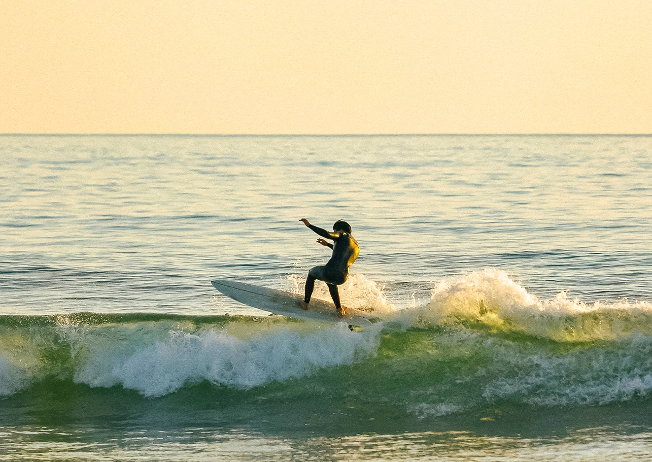a person on a surfboard in the ocean