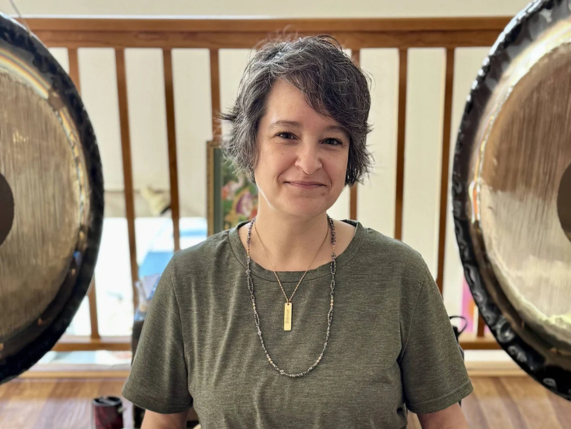 a woman smiling at camera