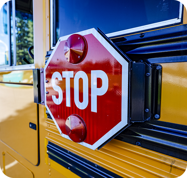 a stop sign on a school bus