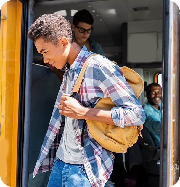 a boy with a backpack on his back