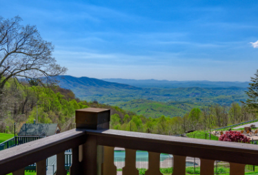 a balcony overlooking a valley