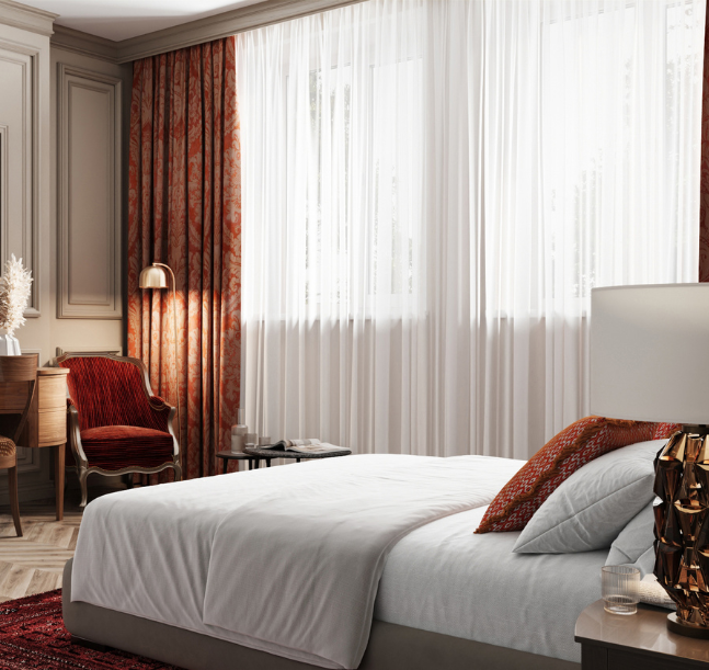 a bedroom with a bed and a desk